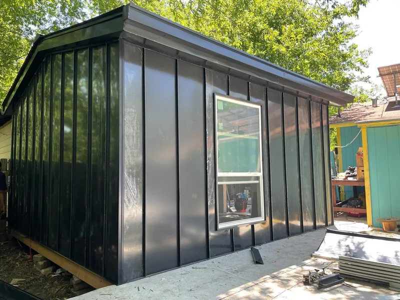 Black standing seam metal wall panels for Metal Roof Installation in Muskogee